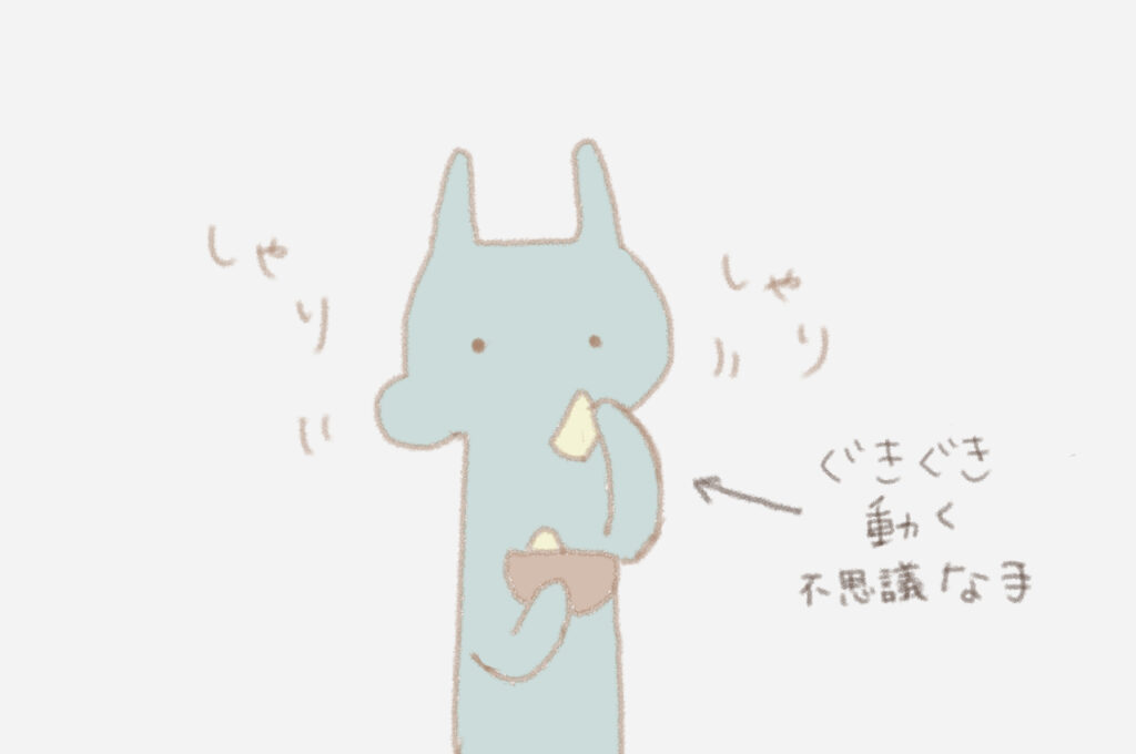 うさおくん（ぐきぐき動く不思議なての持ち主）：しゃりしゃりりんごを食べている。